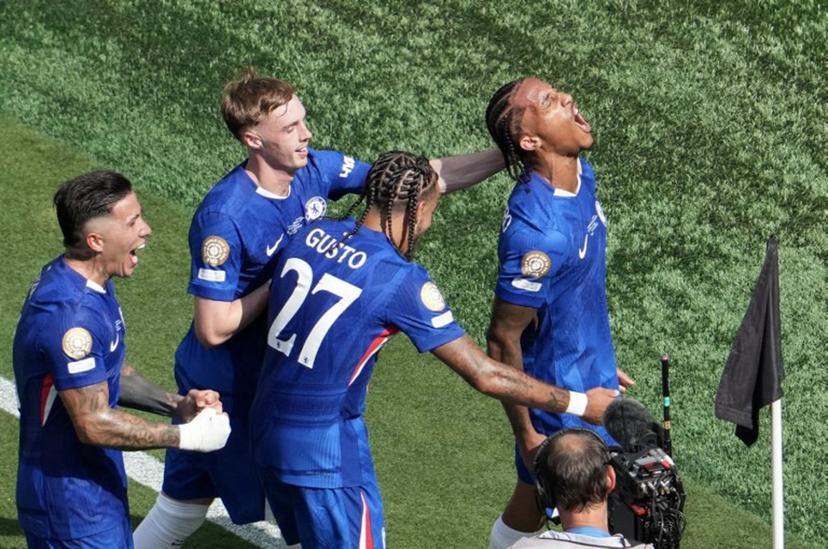 Chelsea's Brazilian forward #20 Joao Pedro (R) celebrates scoring his team's third goal during the FIFA Club World Cup 2025 final football match between England's Chelsea and France's Paris Saint-Germain at the MetLife Stadium in East Rutherford, New Jersey on July 13, 2025.  TIMOTHY A. CLARY / AFP