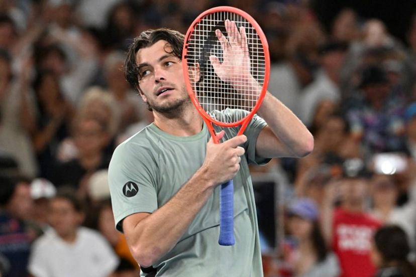 USA's Taylor Fritz celebrates beating Switzerland's Stan Wawrinka in their men's singles match on day seven of the Australian Open tennis tournament in Melbourne on January 24, 2026.  Paul Crock / AFP