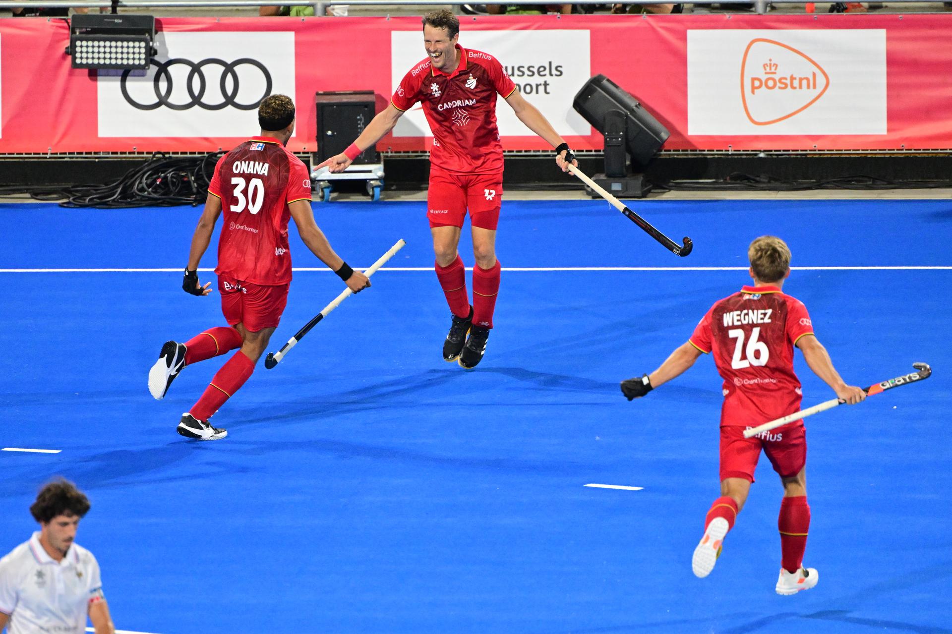 Belgium's Nicolas de Kerpel (C) celebrates after scoring at a hockey game between Belgium's Red Lions and France, the first (out of three) matches during the group stage of the men's 2026 Hockey World Cup, Saturday 15 August 2026 in Wavre. The 2026 edition of the Hockey World Cup takes place in Belgium and The Netherlands from August 15 to August 30. BELGA PHOTO DIRK WAEM