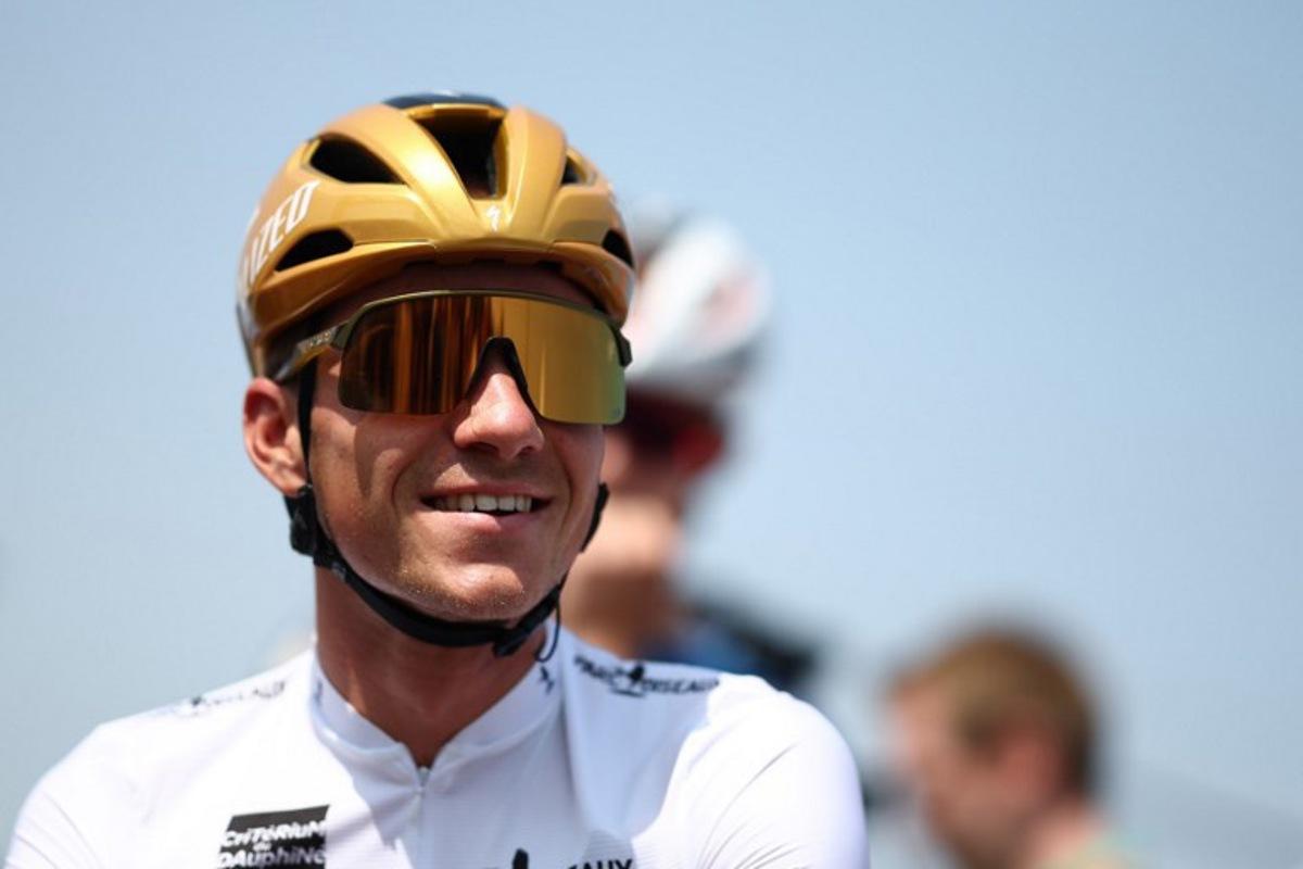 Soudal Quick-Step's Belgian rider Remco Evenepoel wearing the best young rider's white jersey reacts prior to the 2nd stage of the 77th edition of the Criterium du Dauphine cycling race, 204,6 km between Prémilhat and Issoire, on June 9, 2025.  Anne-Christine POUJOULAT / AFP