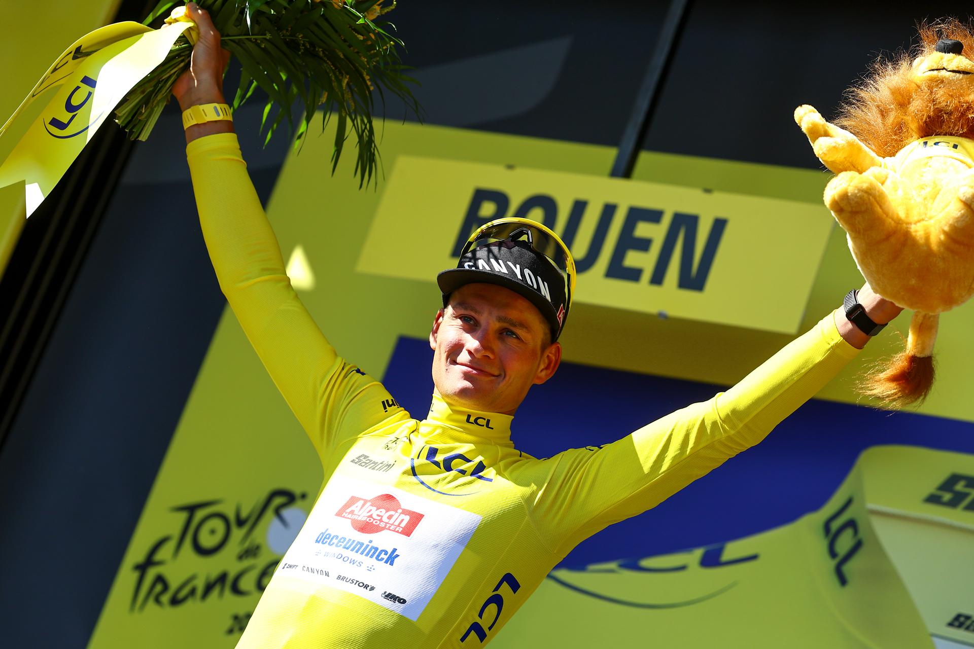 Dutch Mathieu van der Poel of Alpecin-Deceuninck celebrates on the podium in the yellow jersey of leader in the overall ranking after the fourth stage of the 2025 Tour de France cycling, Amien Metropole - Rouen (173 km), on Tuesday 08 July 2025 in France. The 112th edition of the Tour de France starts on Saturday 5 July in Lille, France, and will finish in Paris, France on the 27th of July. BELGA PHOTO DAVID PINTENS