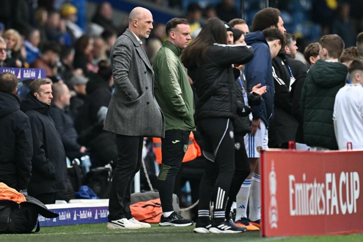 Norwich City's Belgian head coach Philippe Clement (L) looks on ahead of the English FA Cup fifth round football match between Leeds United and Norwich City at Elland Road in Leeds, northern England on March 8, 2026.  Paul ELLIS / AFP