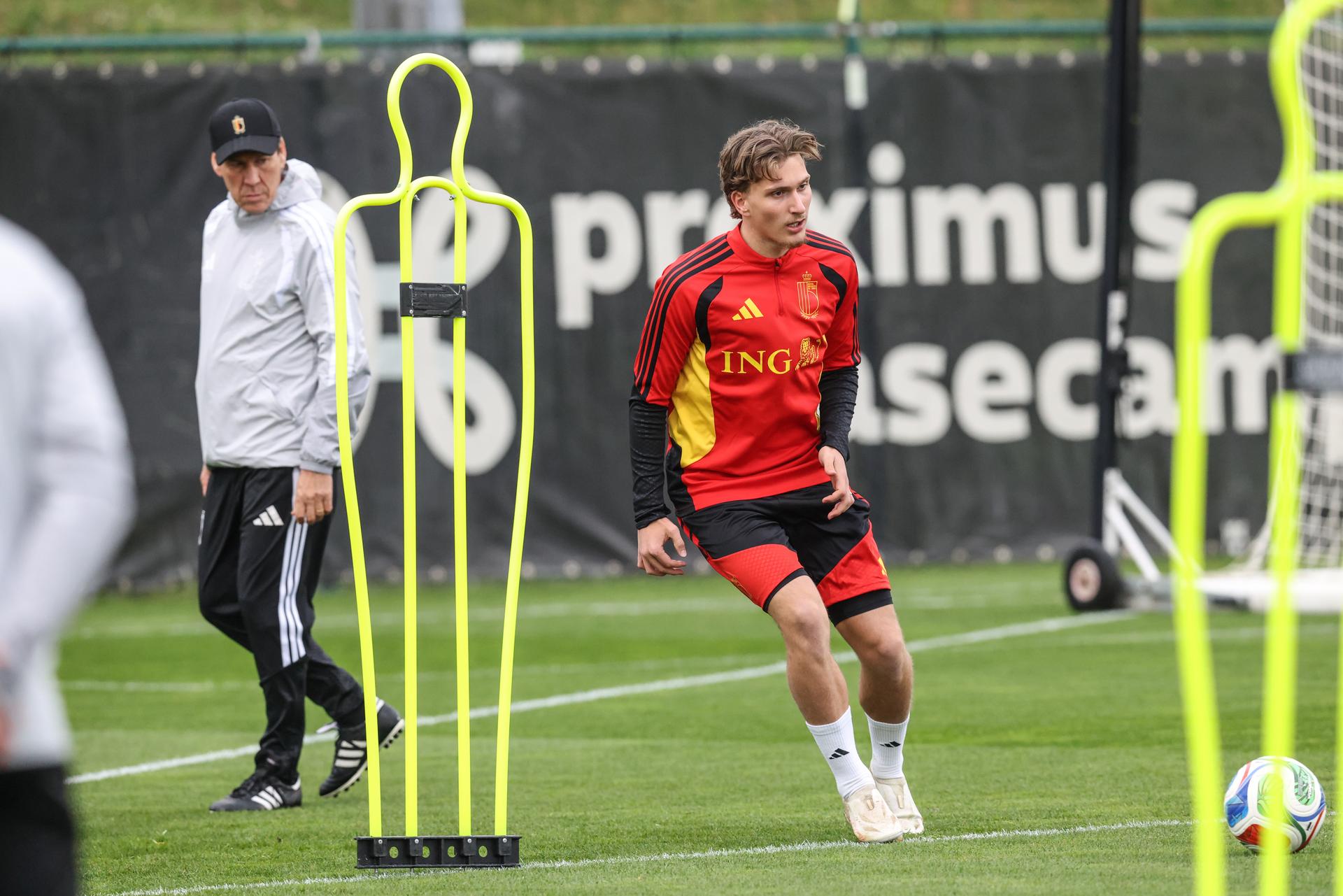 Belgium's head coach Rudi Garcia and Mika Godts pictured during a training session of the Red Devils, the Belgian national soccer team, in Tubize on Tuesday 24 March 2026. The team is preparing for its friendly games against the United States and Mexico. These games are preparation games of the 2026 World Cup. BELGA PHOTO BRUNO FAHY
