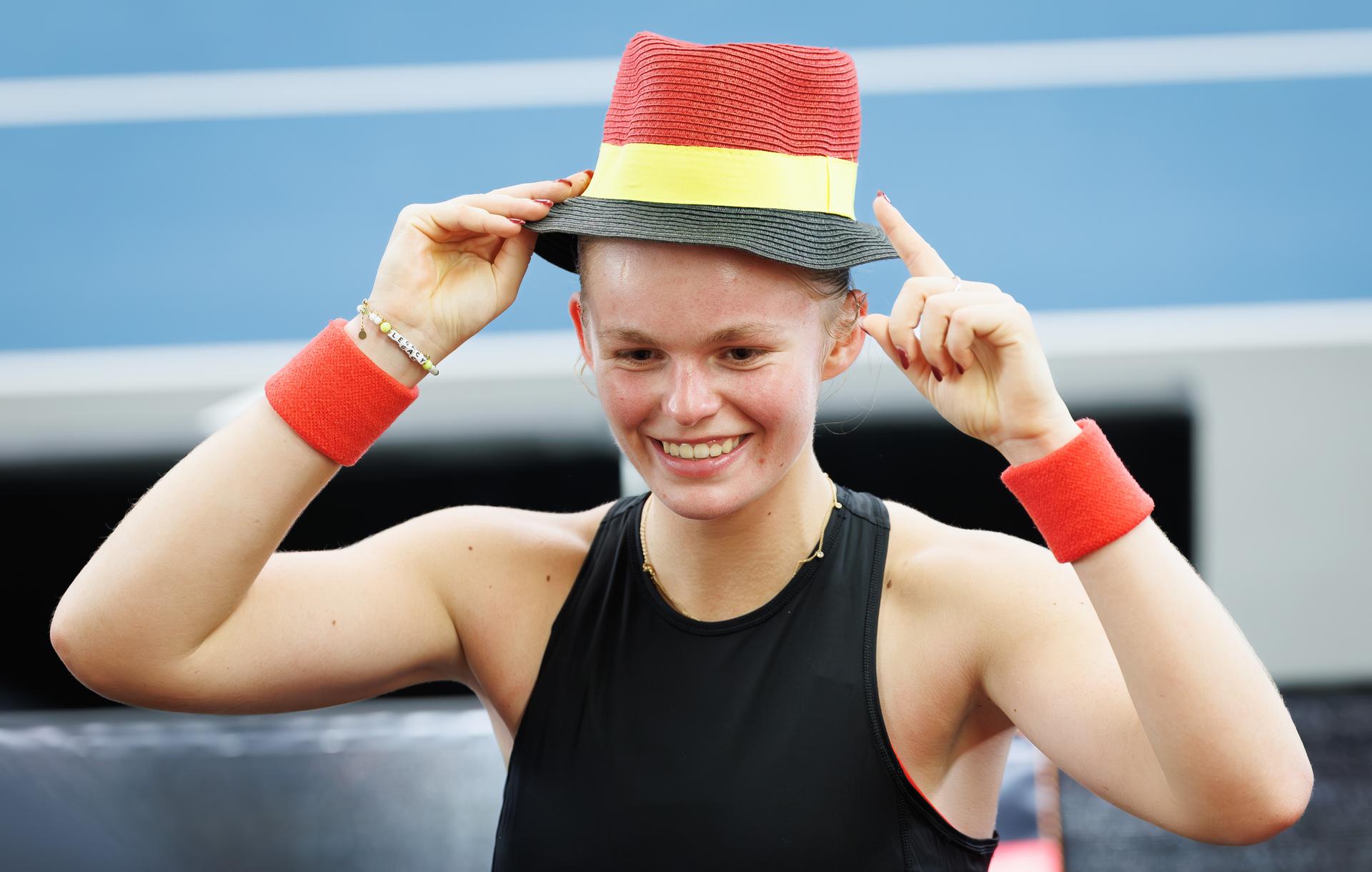 Belgian Jeline Vandromme celebrates winning a tennis match against German Friedsam, during the meeting between Belgium and Germany in the Billie Jean King Cup Play-offs, on Sunday 16 November 2025 in Ismaning, Germany. PHOTO BENOIT DOPPAGNE