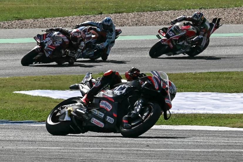 Aprilia Racing's Italian rider Marco Bezzecchi (C) competes during the MotoGP Thailand Grand Prix at the Buriram International Circuit in Buriram on March 1, 2026.  Lillian SUWANRUMPHA / AFP