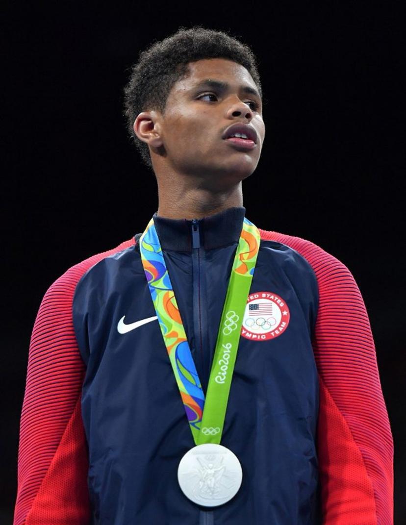 USA's Shakur Stevenson poses on the podium with a medal during the Rio 2016 Olympic Games at the Riocentro - Pavilion 6 in Rio de Janeiro on August 20, 2016.    Yuri CORTEZ / AFP