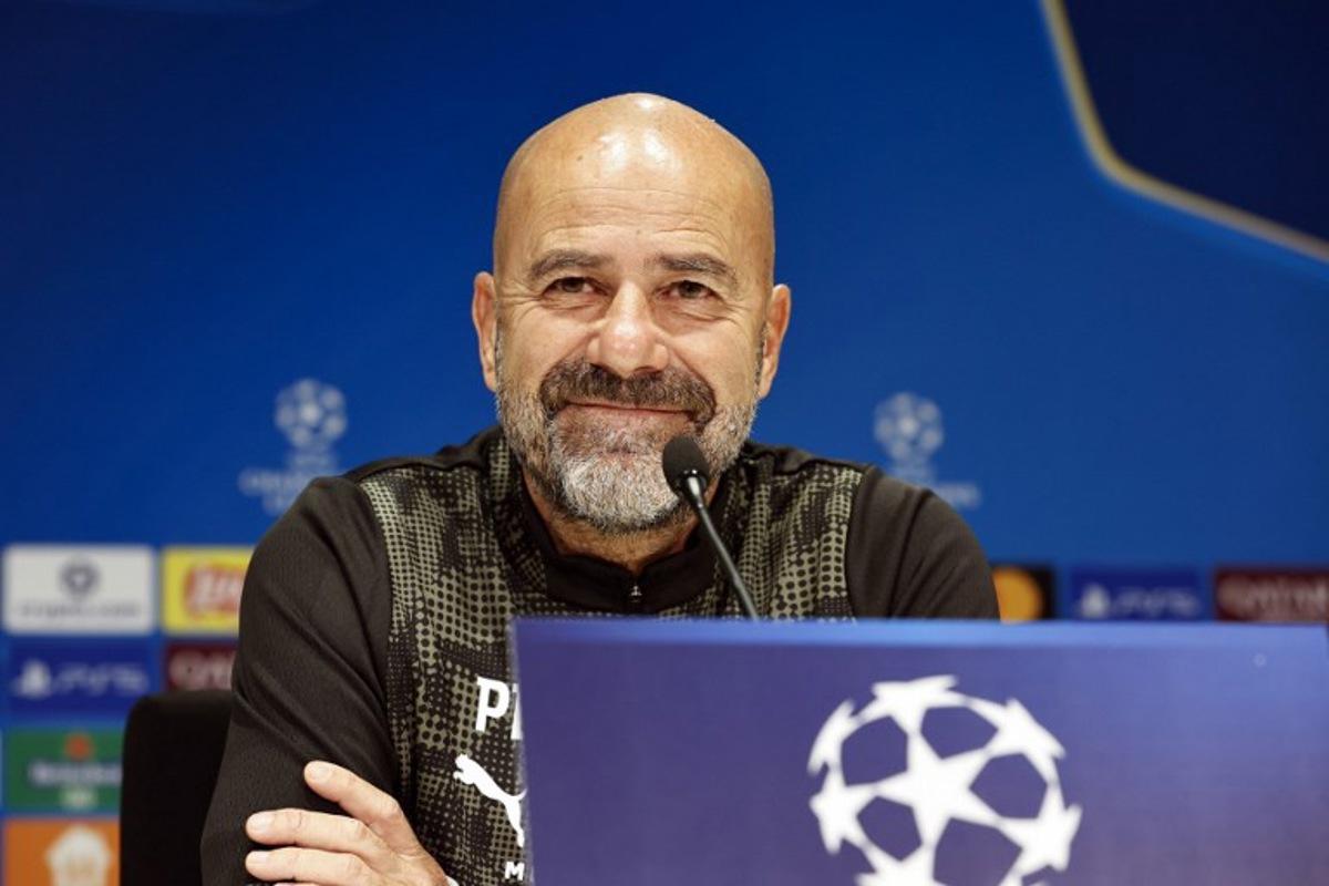 PSV Eindhoven Dutch coach Peter Bosz speaks during a press conference on the eve of the UEFA Champions League match PSV Eindhoven (Ned) against Union Sint-Gillis (Bel) at the Philips Stadium, in Eindhoven on September 15, 2025.  MAURICE VAN STEEN / ANP / AFP