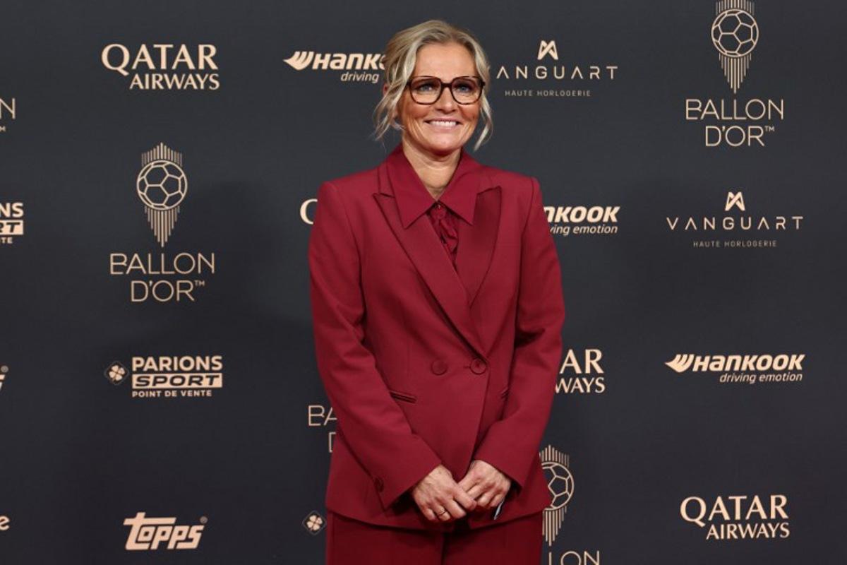 England's football team's Dutch head coach Sarina Wiegman poses upon arrival before the 2025 Ballon d'Or France Football award ceremony at the Theatre du Chatelet in Paris on September 22, 2025.  FRANCK FIFE / AFP