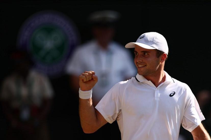 Britain's Arthur Fery celebrates winning a point against Italy's Flavio Cobolli during their men's singles quarter-final tennis match on the tenth day of the 2026 Wimbledon Championships at The All England Lawn Tennis and Croquet Club in Wimbledon, southwest London, on July 8, 2026.  Henry Nicholls / AFP