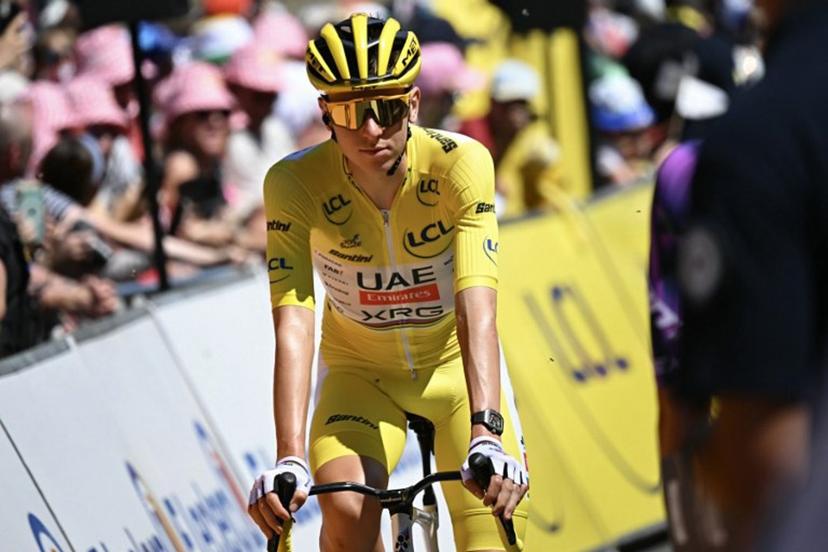 UAE Team Emirates - XRG team's Slovenian rider Tadej Pogacar wearing the overall leader's yellow jersey looks on at the start of the 6th stage of the 112th edition of the Tour de France cycling race, 201.5 km between Bayeux and Vire Normandie, Northwestern France on July 10, 2025.  Loic VENANCE / AFP