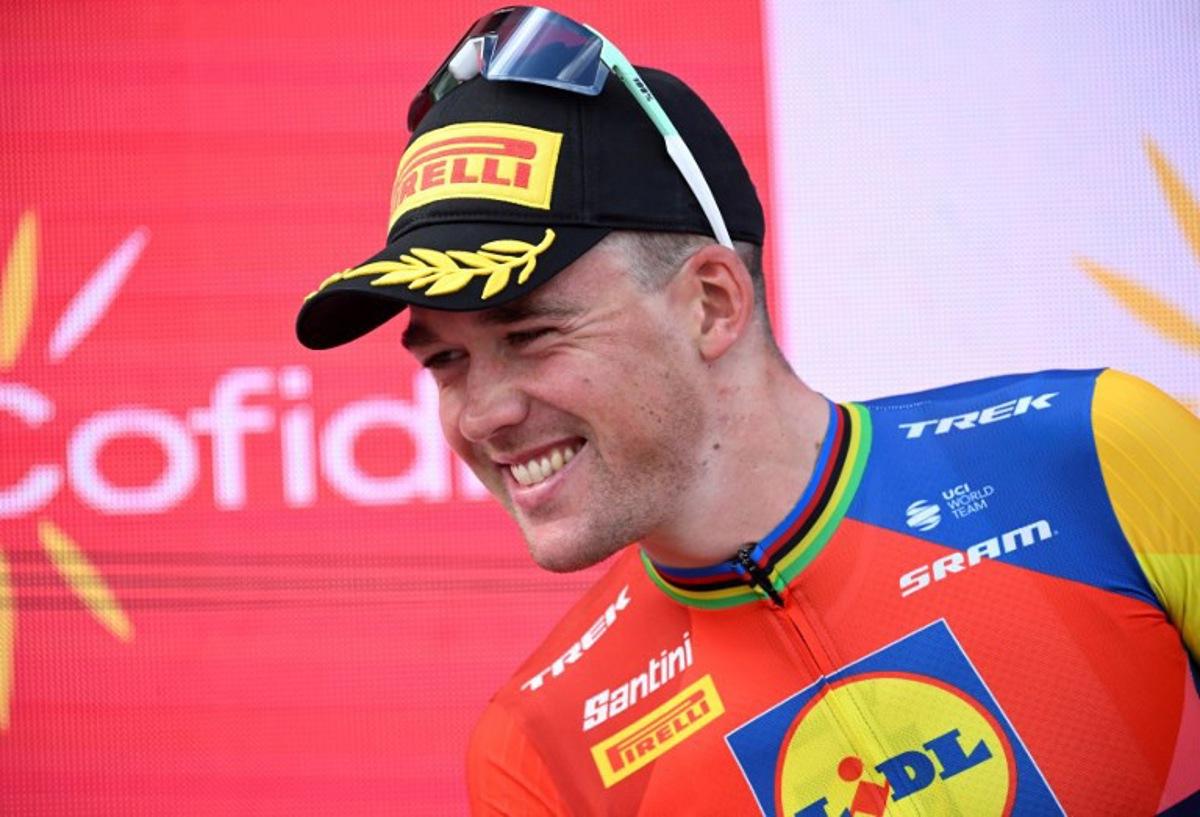 Stage winner Team Lidl-Trek's Danish rider Mads Pedersen celebrates on the podium after the 15th stage of the Vuelta a Espana cycling tour, a 167 km race between A Veiga/Vegaredo and Monforte de Lemos, on September 7, 2025.    Miguel RIOPA / AFP