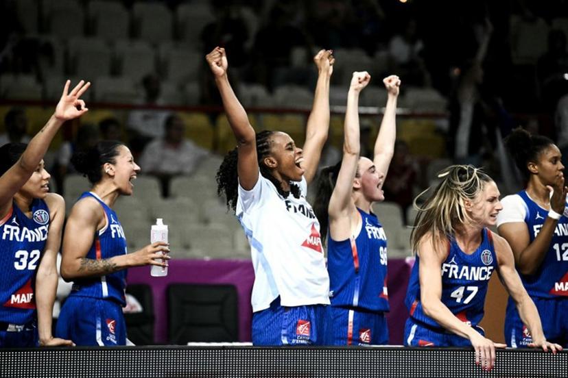 France's players celebrate after winning the FIBA Women's EuroBasket 2025 match between France and Turkey at the Peace and Friendship Stadium in Athens on June 18, 2025.   Angelos Tzortzinis / AFP