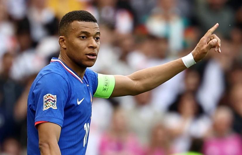 France's forward #10 Kylian Mbappe celebrates after scoring the 0-1 goal during the UEFA Nations League third place play-off football match between Germany and France in Stuttgart, southwestern Germany on June 8, 2025.  FRANCK FIFE / AFP