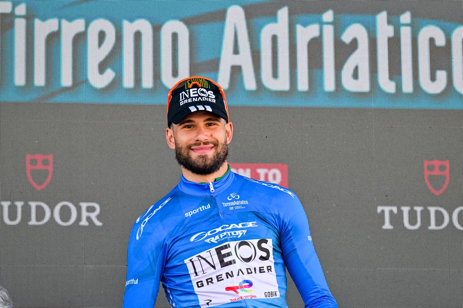 Italian Filippo Ganna of INEOS Grenadiers celebrates on the podium after winning the first stage of the Tirreno-Adriatico cycling race, a 11,5km individual time trial in Lido di Camaiore, Italy, Monday 09 March 2026. BELGA PHOTO DIRK WAEM