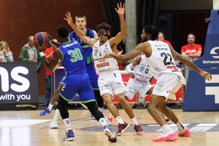 Mons' Tito Casero and Kortrijk's Diego Bernard fight for the ball during a basketball match between House of Talents Spurs Kortrijk and Mons-Hainaut, Friday 10 October 2025 in Kortrijk, on day 3 of the 'BNXT League' first division basket championship. BELGA PHOTO KURT DESPLENTER