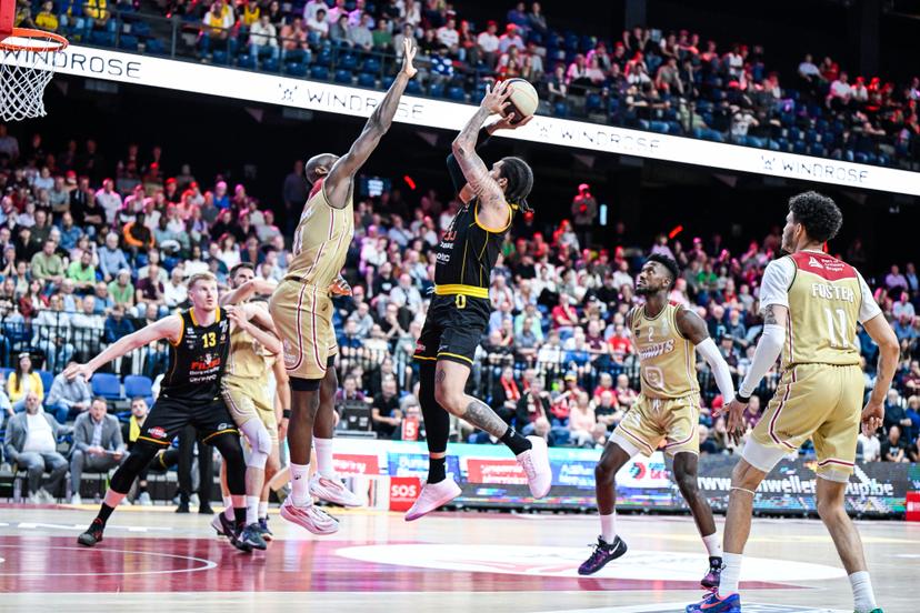 Antwerp's Kevin Tumba and Oostende's Timmy Allen pictured in action during a basketball match between Antwerp Giants and BC Oostende, Thursday 15 May 2025 in Antwerp, a quarter final game (2nd leg, best-of-3) in the playoffs of the 'BNXT League' Belgian/ Dutch first division basket championship. BELGA PHOTO TOM GOYVAERTS