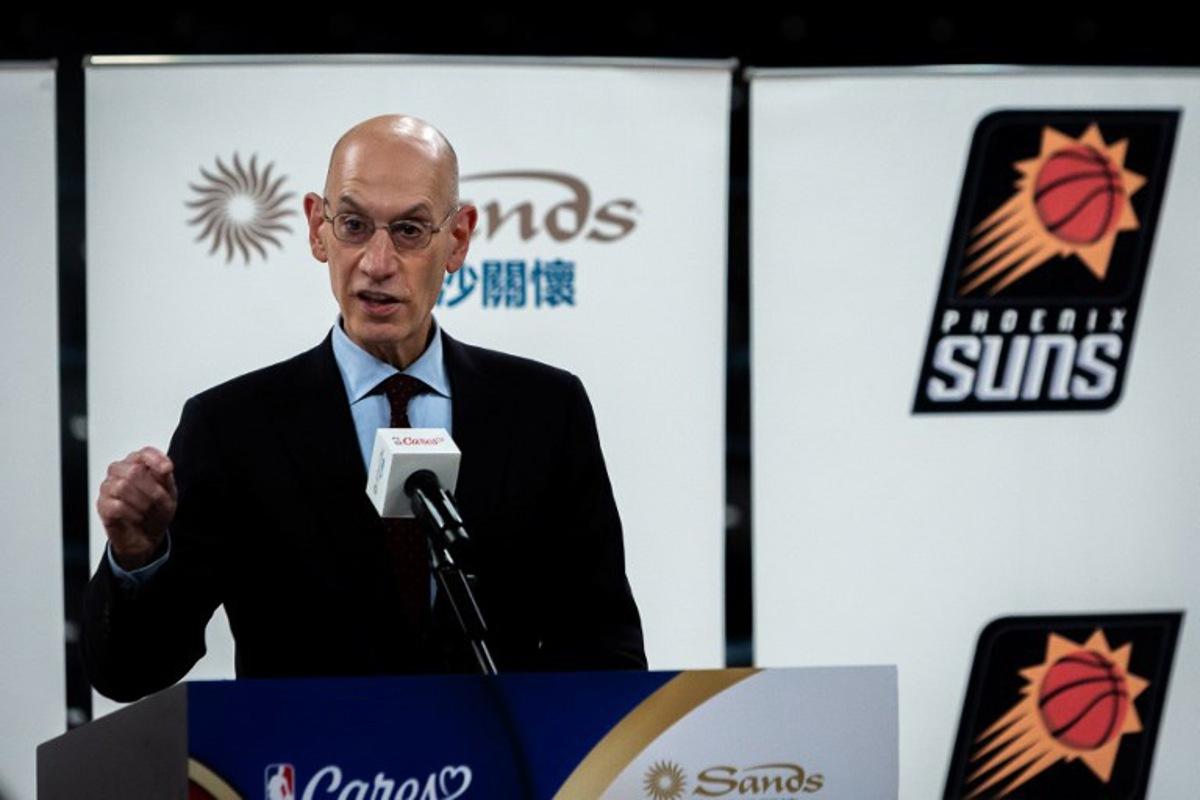 Commissioner of the NBA Adam Silver delivers a speech ahead of the NBA pre-season basketball games, at the Venetian Arena in Macau on October 9, 2025. The NBA returns to the lucrative China market this week with two pre-season games following a six-year absence after a team official tweeted his support for pro-democracy protests in Hong Kong. The Brooklyn Nets and the Phoenix Suns will play sell-out games on October 10 and October 12 in Macau, a special administrative region of China close to Hong Kong. Eduardo Leal / AFP