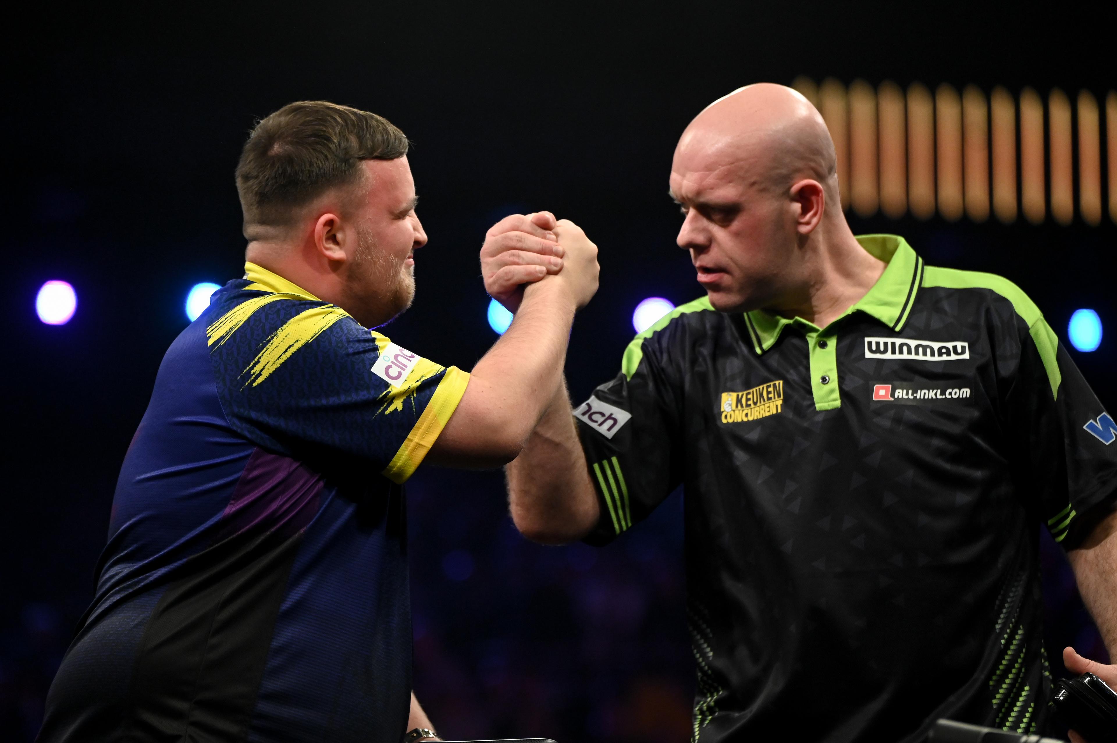 English Luke Littler shakes hands with Dutch Michael van Gerwen after the semifinal at the Premier League (Night 2/16) darts event in Antwerp on Thursday 12 February 2026. BELGA PHOTO ELIAS ROM