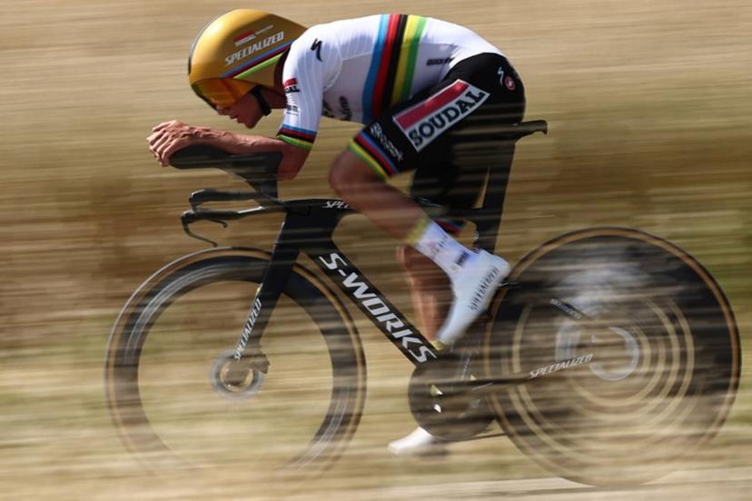 Soudal Quick-Step's Belgian rider Remco Evenepoel cycles during the 4th stage of the 77th edition of the Criterium du Dauphine cycling race, a 17,4 km individual time trial between Charmes-sur-Rhône and Saint-Péray, on June 11, 2025.  Anne-Christine POUJOULAT / AFP