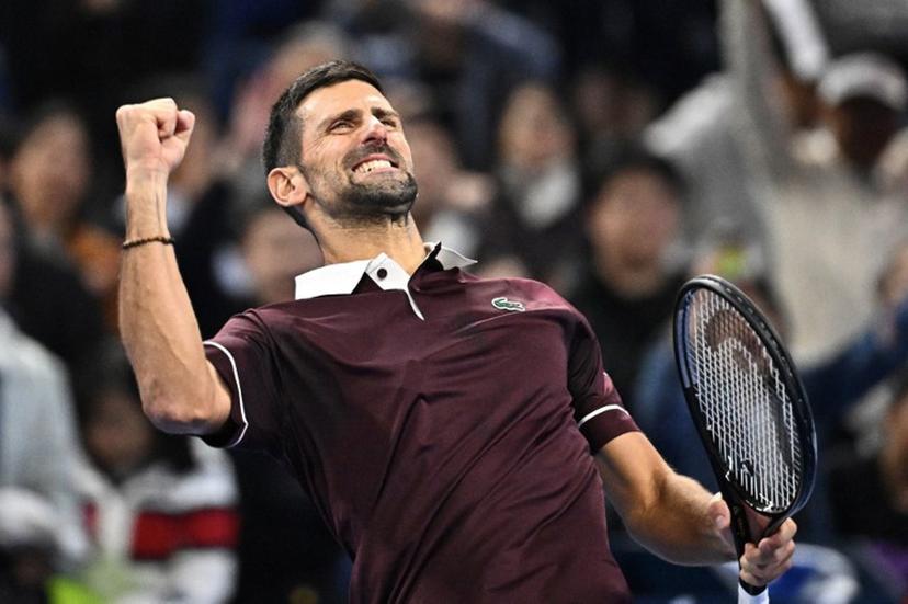 Serbia's Novak Djokovic celebrates his victory against China's Bu Yunchaokete during their men's singles match at the China Open tennis tournament in Beijing on October 2, 2026.  Pedro PARDO / AFP