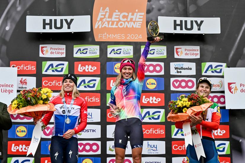 Dutch Demi Vollering of SD Worx - Protime, Polish Katarzyna Niewiadoma of Canyon-SRAM and Italian Elisa Longo Borghini of Lidl-Trek pictured on the podium after the women's race of the 'La Fleche Wallonne', one day cycling race (Waalse Pijl - Walloon Arrow), 146 km with start and finish in Huy, Wednesday 17 April 2024. BELGA PHOTO ERIC LALMAND