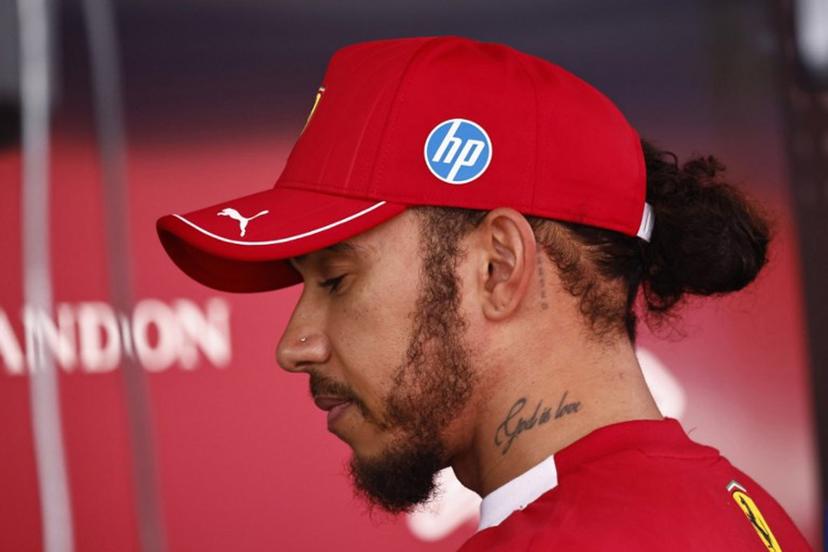 Ferrari's British driver Lewis Hamilton looks on after the Sprint Race of the Formula One Belgian Grand Prix at the Spa-Francorchamps circuit in Spa, on July 26, 2025.  SIMON WOHLFAHRT / AFP