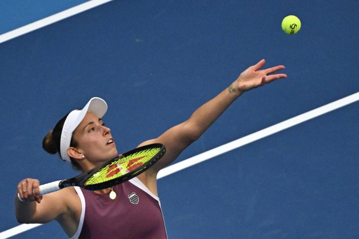 Belgium's Elise Mertens serves to USA's Coco Gauff during their women's singles match at the China Open tennis tournament in Beijing on October 7, 2026.  Pedro Pardo / AFP