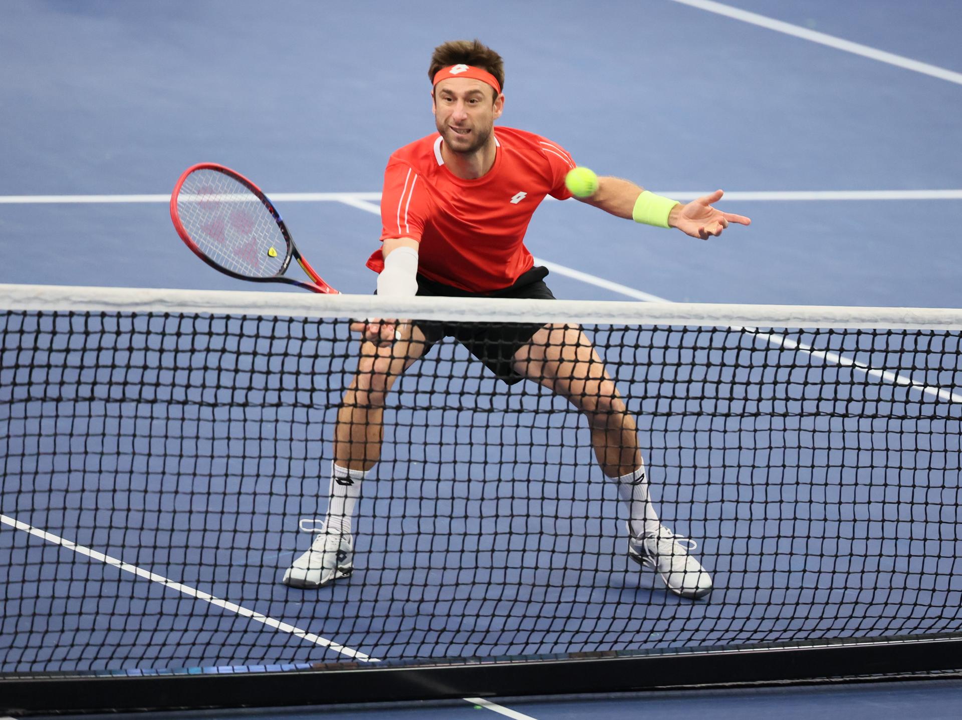 Belgian Sander Gille and pictured during a double game between Belgian pair Gille-Vliegen and Chilean pair Barrios Vera-Jarry, the third match in the Davis Cup qualifiers World Group tennis meeting between Belgium and Chile, , in Hasselt. BELGA PHOTO BENOIT DOPPAGNE