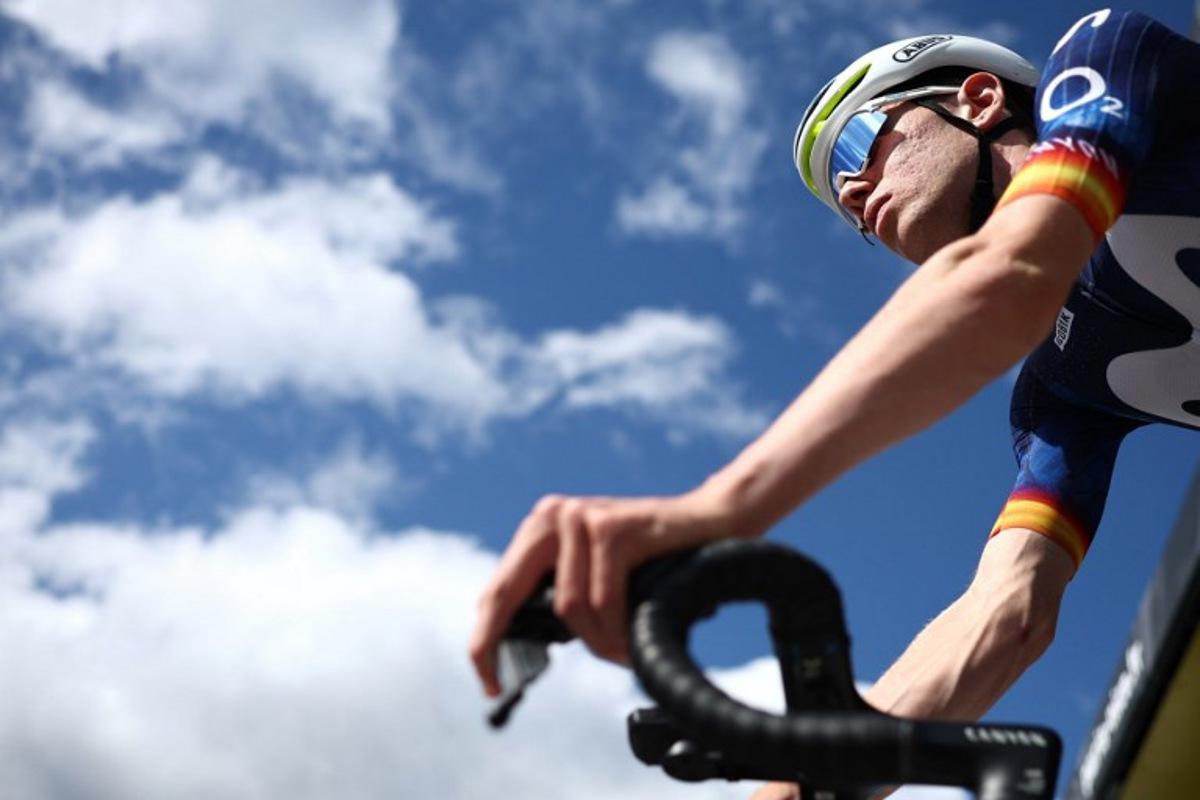 Movistar Team's Spanish rider Ivan Romeo waits for the start of the 2nd stage of the Paris-Nice cycling race, 187 km between Épône and Montargis, on March 9, 2026.  Anne-Christine POUJOULAT / AFP