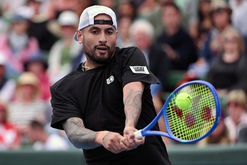 Nick Kyrgios of Australia hits a return during his men's singles match against Zhang Zhizhen of China at the Kooyong Classic tennis tournament in Melbourne on January 13, 2026.  William WEST / AFP