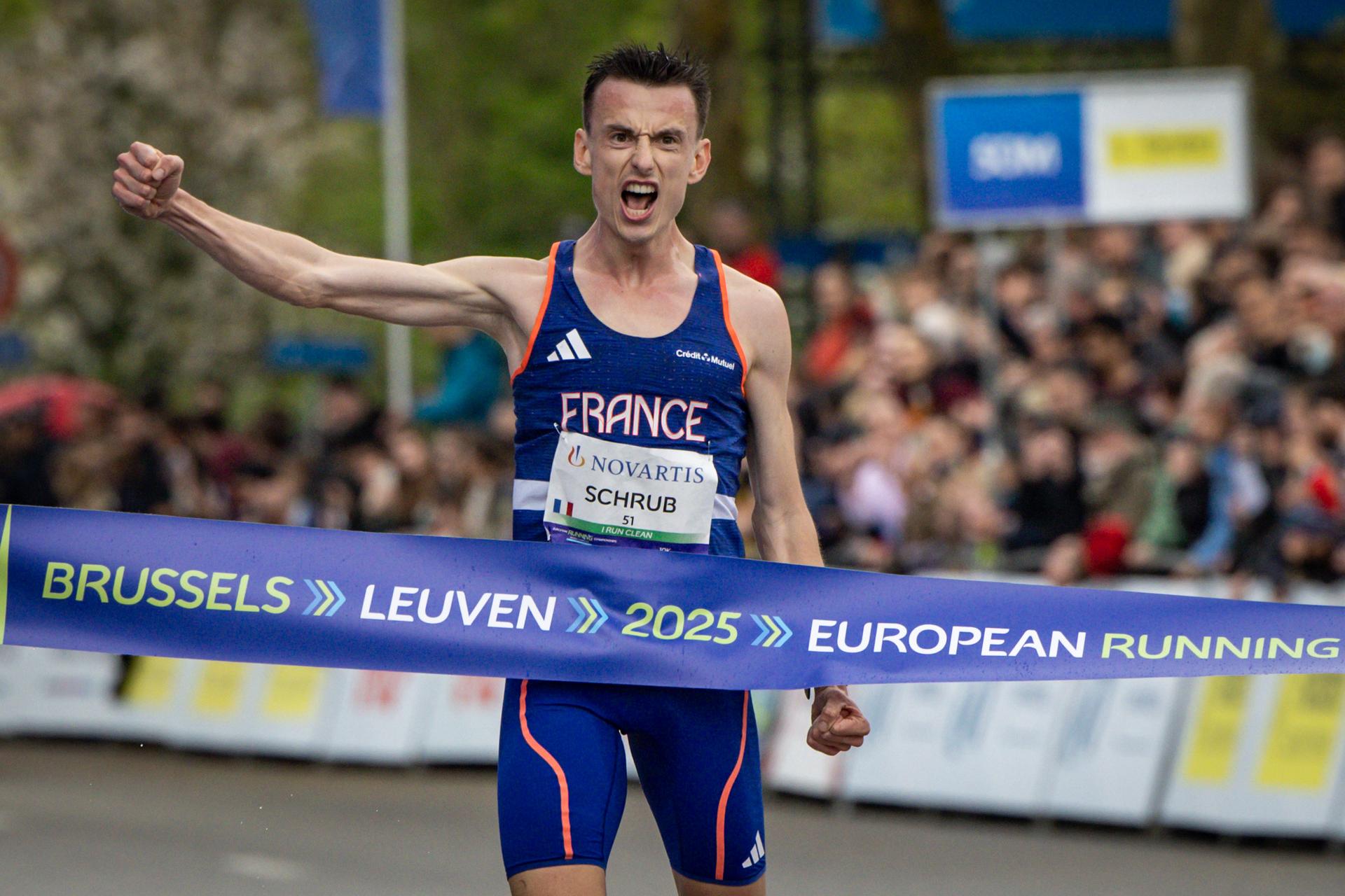 French Yann Schrub celebrates as he crosses the finish line to win the men 10km race at European Running Championships, in Leuven, Sunday 13 April 2025. BELGA PHOTO DAVID PINTENS