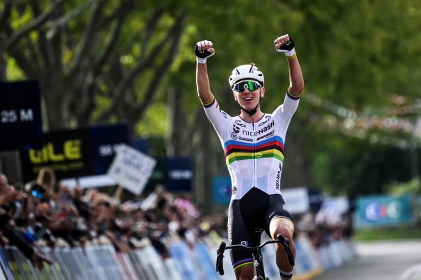 Slovenian rider Tadej Pogacar celebrates as he wins the men's Elite Road Race at the European Cycling Championship 2025 near Valence, southeastern France on October 5, 2025.  JEFF PACHOUD / AFP