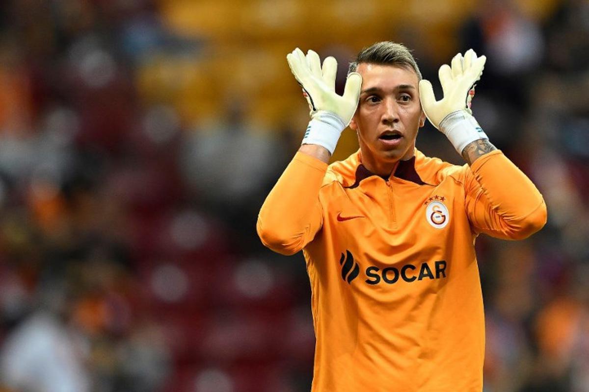 Galatasaray's Uruguayan goalkeeper Fernando Muslera gestures during the UEFA Champions League Group A between Galatasaray and FC Copenhagen at the Rams Park stadium in Istanbul, on September 20, 2023.  Yasin AKGUL / AFP