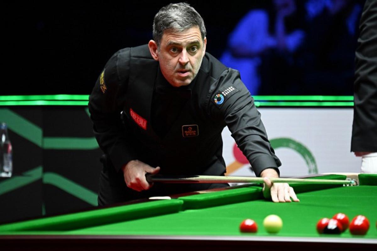 Britain's Ronnie O'Sullivan plays a shot against compatriot Joe O'Connor in round 1 of the Snooker World Grand Prix 2026 in Hong Kong on February 4, 2026.  Peter PARKS / AFP