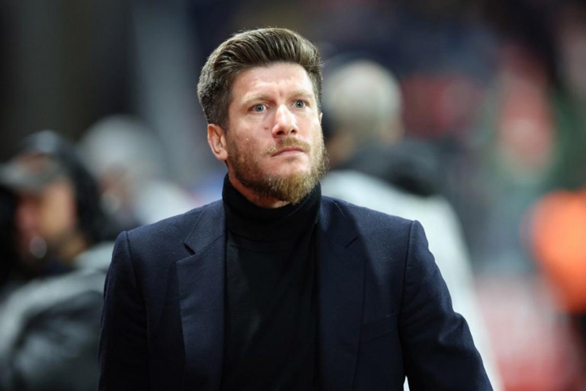 Monaco's Belgian head coach Sebastien Pocognoli looks on during the French L1 football match between Stade Brestois 29 (Brest) and AS Monaco at the Francis-Le-Ble stadium in Brest, western France, on December 5, 2025.  Fred TANNEAU / AFP