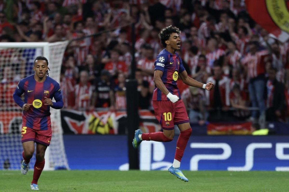 Barcelona's Spanish forward #10 Lamine Yamal celebrates scoring his team's first goal during the UEFA Champions League quarter final second leg football match between Club Atletico de Madrid and FC Barcelona at Metropolitano Stadium in Madrid on April 14, 2026.  Thomas COEX / AFP