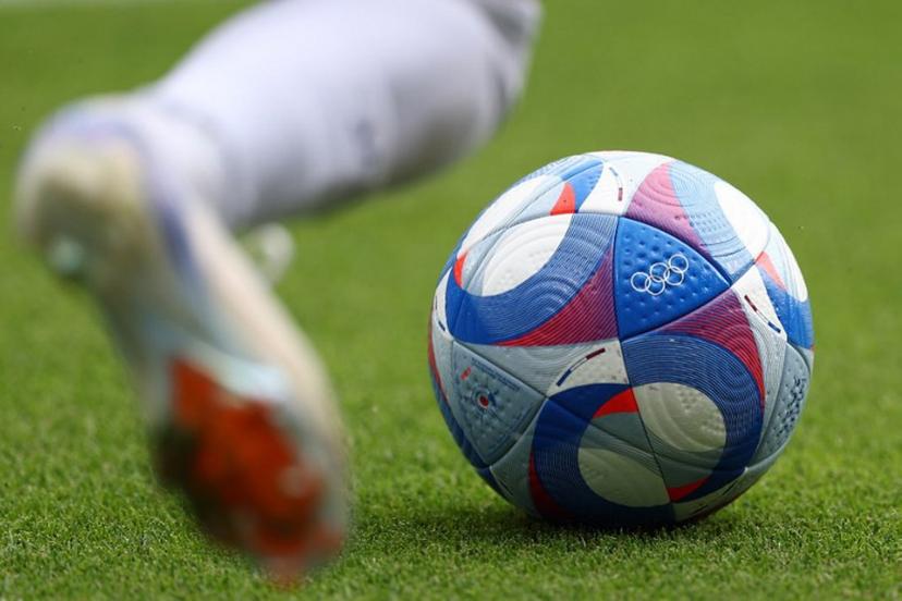 A photo shows a competition ball being played during  the men's group C football match between Uzbekistan and Spain of the the Paris 2024 Olympic Games at the Parc des Princes in Paris on July 24, 2024.  FRANCK FIFE / AFP