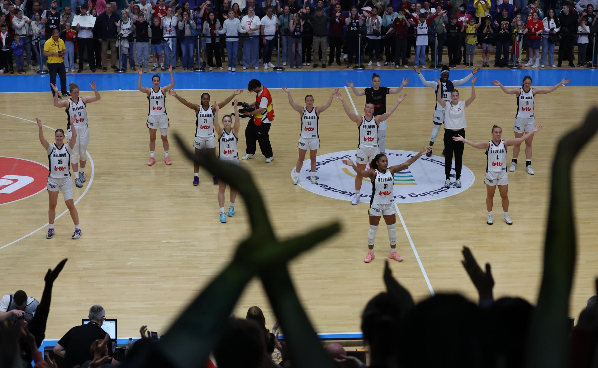 Belgian Cats' players celebrate after winning a friendly basket game between Belgium's national team Belgian Cats and Italy, in Jemappes, on Friday 23 May 2025. BELGA PHOTO VIRGINIE LEFOUR