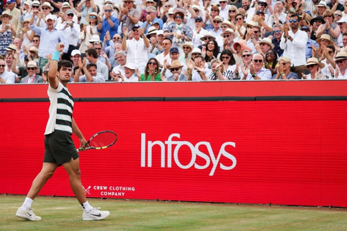 Spain's Carlos Alcaraz celebrates winning a point in tie break against Czech Republic's Jiri Lehecka  during their men's singles final tennis match at the HSBC ATP tennis Championships at Queen's Club in west London on June 22, 2025.  Adrian Dennis / AFP