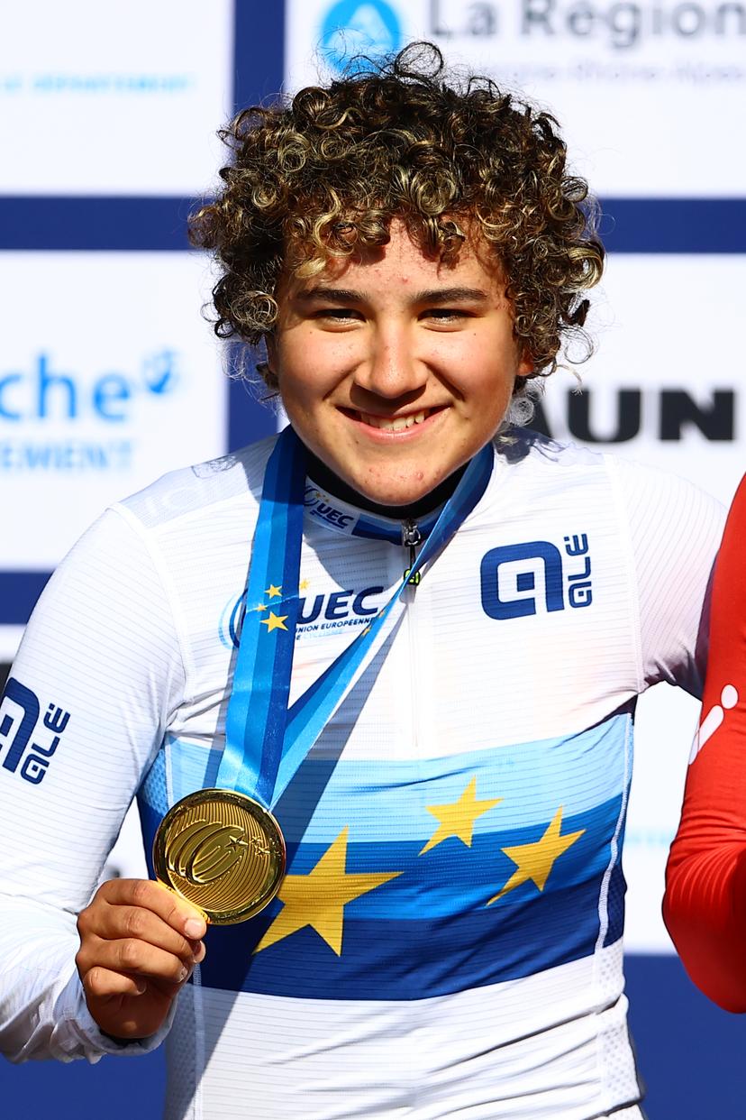Spanish Paula Ostiz celebrates on the podium with her gold medal after winning the 12,2 km time trial of the Women junior category at the UEC road European cycling championships, Wednesday 01 October 2025, in Loriol-sur-Drome, France. The European cycling championships Drome-Ardeche takes place from 1 to 5 October, France. BELGA PHOTO DAVID PINTENS