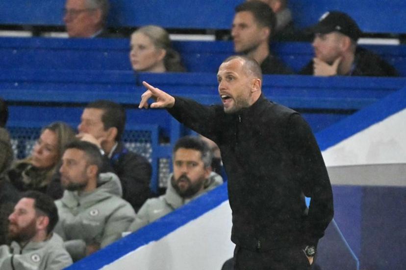 Ajax's Dutch head coach John Heitinga gestures from the touchline during the UEFA Champions League league-phase football match between Chelsea and Ajax at Stamford Bridge in London on October 22, 2025.  Glyn KIRK / AFP