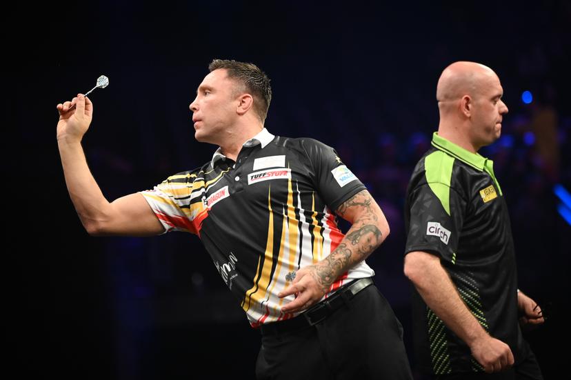 Welsh Gerwyn Price and Dutch Michael Van Gerwen pictured in action during the final at the Premier League (Night 2/16) darts event in Antwerp on Thursday 12 February 2026. BELGA PHOTO ELIAS ROM