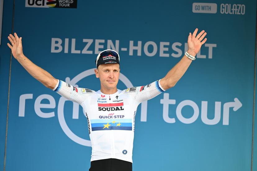 Belgian Tim Merlier of Soudal Quick-Step celebrates on the podium after winning the fourth stage of the 'Renewi Tour' multi-stage cycling race, from Riemst to Bilzen-Hoeselt (196 km) on Saturday 23 August 2025. The five-day race takes place in Belgium and the Netherlands.  BELGA PHOTO DAVID PINTENS
