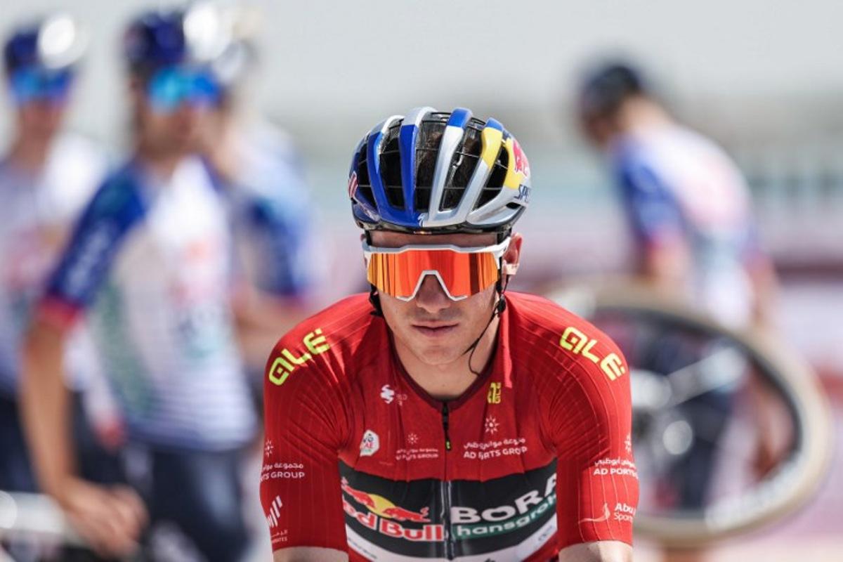 Red Bull-Bora-Hansgrohe's Belgian rider Remco Evenepoel prepares for the third stage of the UAE Tour cycling event from Umm al-Quwain to Jebel Mobrah in Umm al-Quwain on February 18, 2026.  Fadel SENNA / AFP