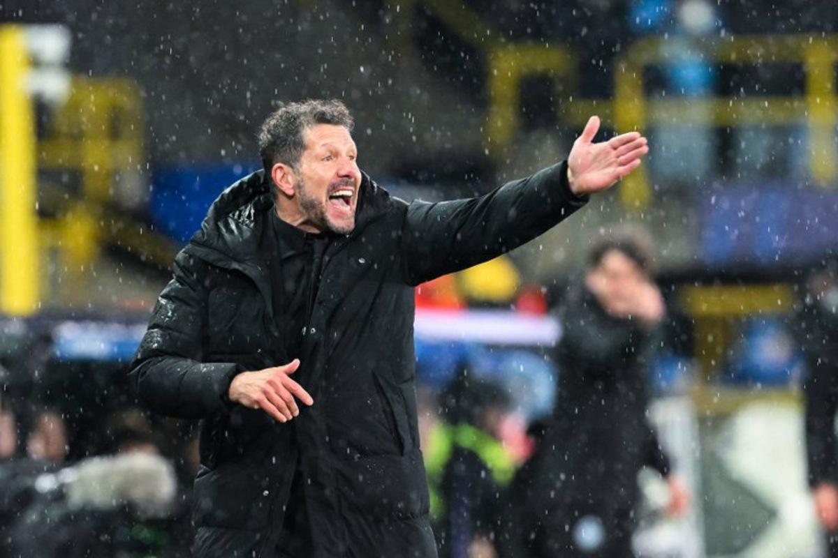 Atletico Madrid's Argentine coach Diego Simeone gestures during the UEFA Champions League knockout round play-off first leg football match between Club Brugge and Atletico Madrid at the Jan Breydel Stadium in Brugge on February 18, 2026. NICOLAS TUCAT / AFP