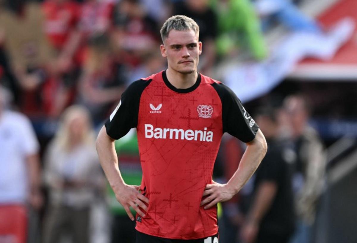 Bayer Leverkusen's German midfielder #10 Florian Wirtz reacts after the German first division Bundesliga football match between Bayer Leverkusen and Union Berlin in Leverkusen, western Germany, on April 12, 2025. INA FASSBENDER / AFP