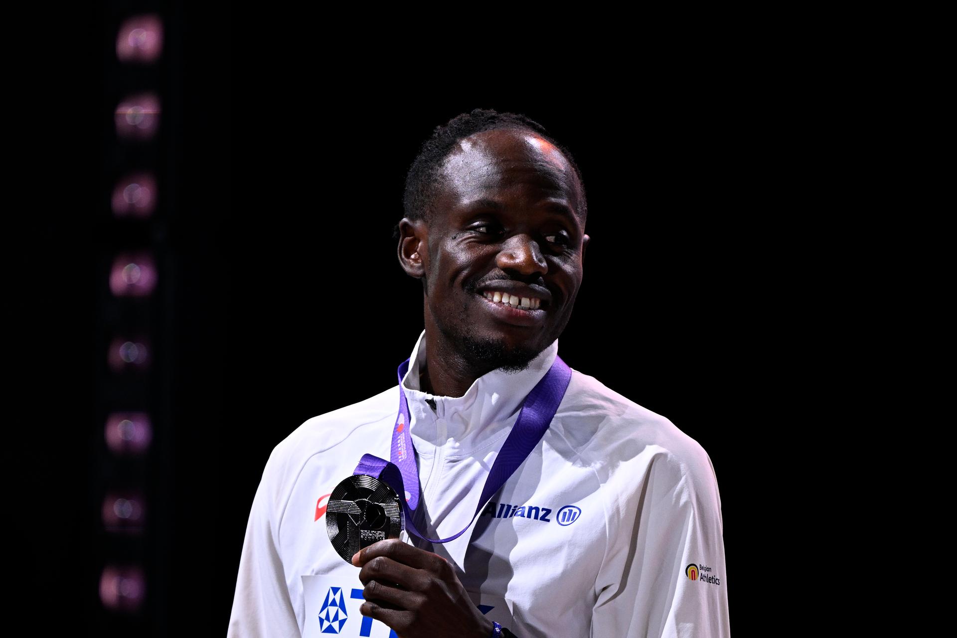 Belgian Isaac Kimeli celebrates his silver medal on the podium of the 5000m men final, at the World Athletics Championships in Tokyo, Japan, on Sunday 21 September 2025. The outdoor Worlds are taking place from 13 to 21 September. BELGA PHOTO JASPER JACOBS