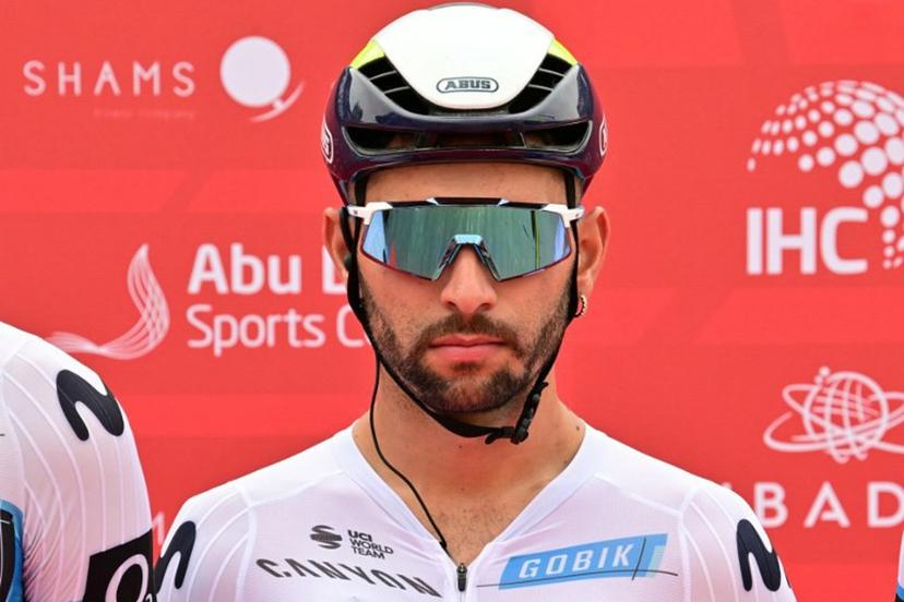 Movistar team's Colombian rider Fernando Gaviria looks on during the first stage of the UAE Tour cycling race from Shams Solar Power Station Madinat Zayed to Liwa Palace in Abu Dhabi on February 17, 2025. Giuseppe CACACE / AFP