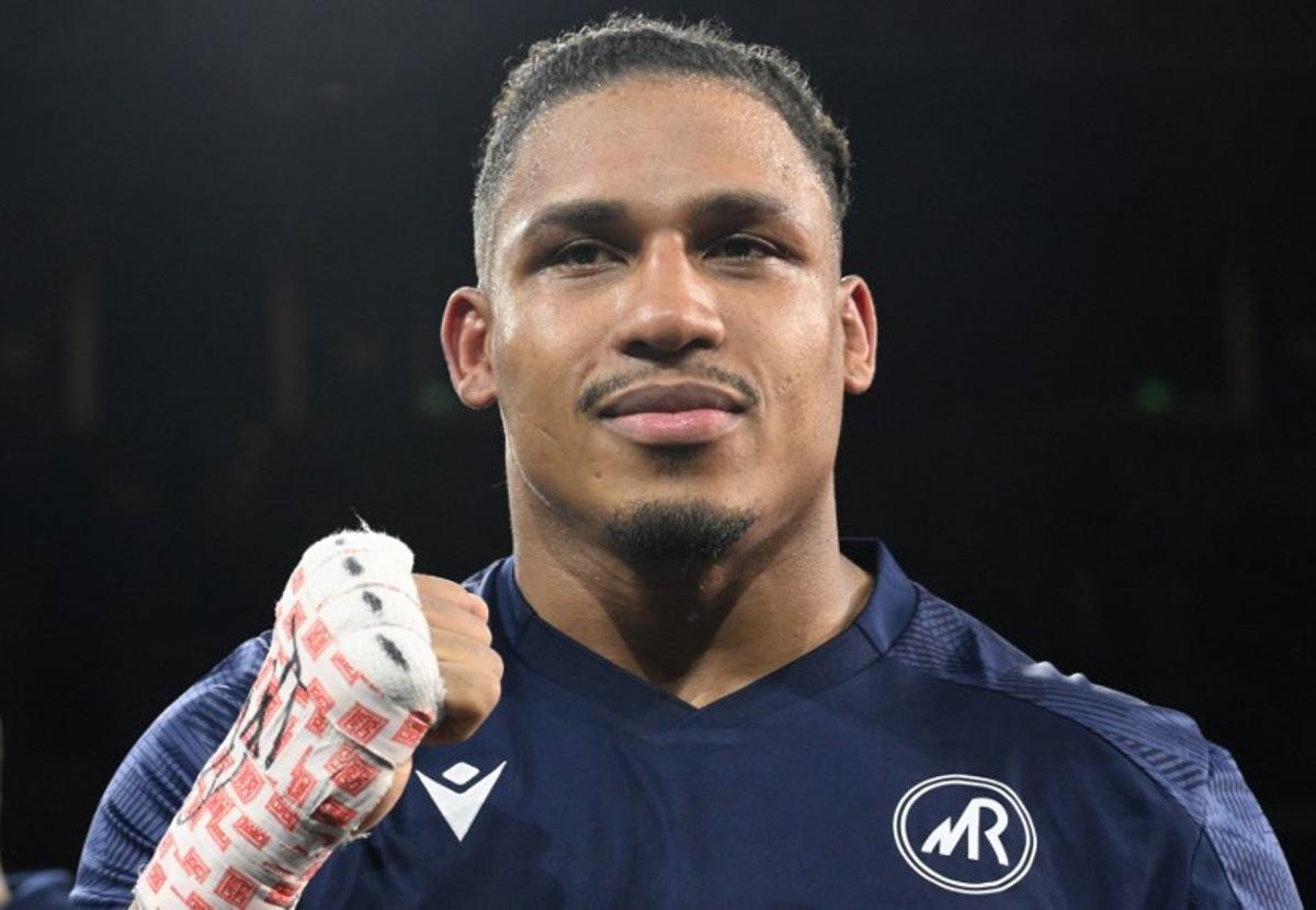 Belgium's Ryad Merhy poses at the end of his International Heavyweight boxing bout against France's Tony Yoka at the Roland Garros complex in western Paris, on December 9, 2023. Miguel MEDINA / AFP