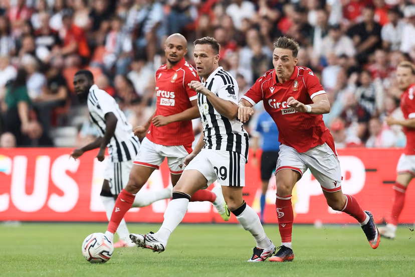 Juventus' Arthur Melo and Standard's Casper Nielsen fight for the ball during a friendly soccer game between Belgian first division soccer team Standard de Liege and Italian Juventus, on Saturday 25 July 2026 in Liege, in preparation of the upcoming 2026-2027 Belgian first division soccer season. BELGA PHOTO BRUNO FAHY
